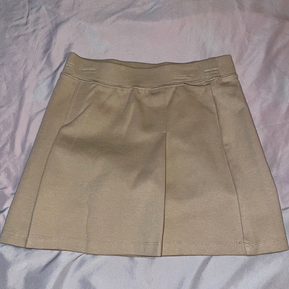 Wonder nation tan school uniform skirt.